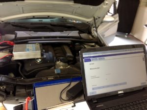 BMW 3-series (E90) getting software update after component replacement.