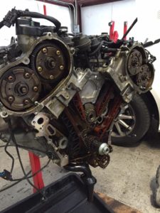 Mercedes M272 front cover removed for balance shaft replacement.