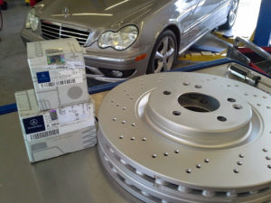 Genuine Mercedes-Benz brake pads and high quality "sport" package rotors.