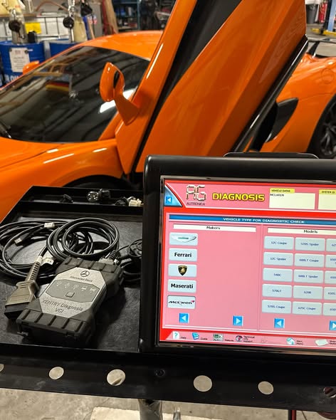 orange McLaren showcasing the advanced Leonardo Diagnostic tool